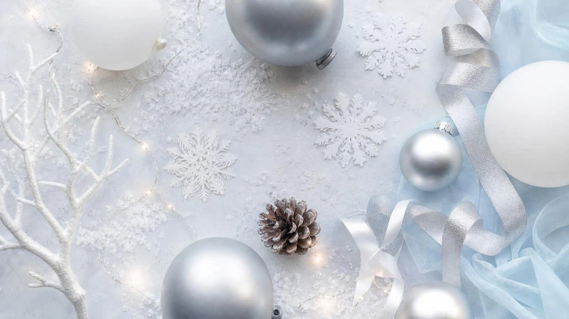 A winter wonderland party color palette in white, silver, icy blue, and gold
