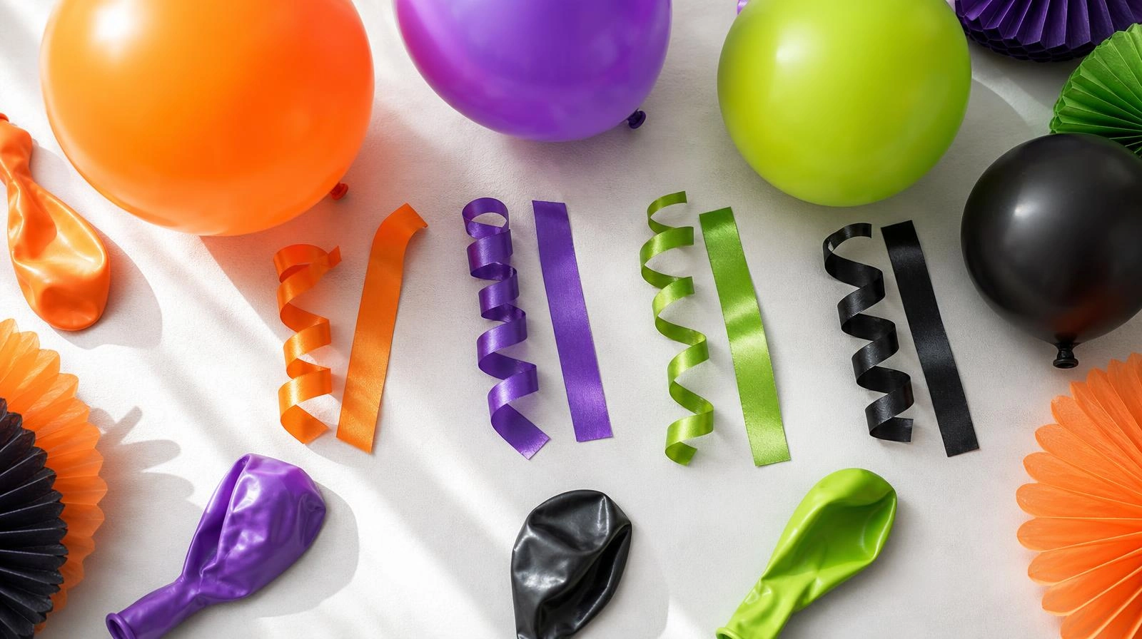 Kids Halloween party color palette in orange, purple, green and black